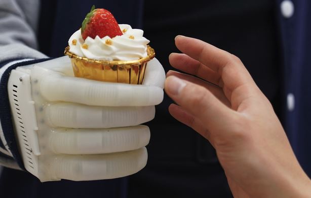 Inflatable Robotic Hand with Real-Time Tactile Control