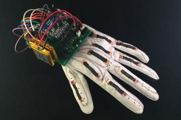 The Language of Glove: Smart Glove That Translates ASL